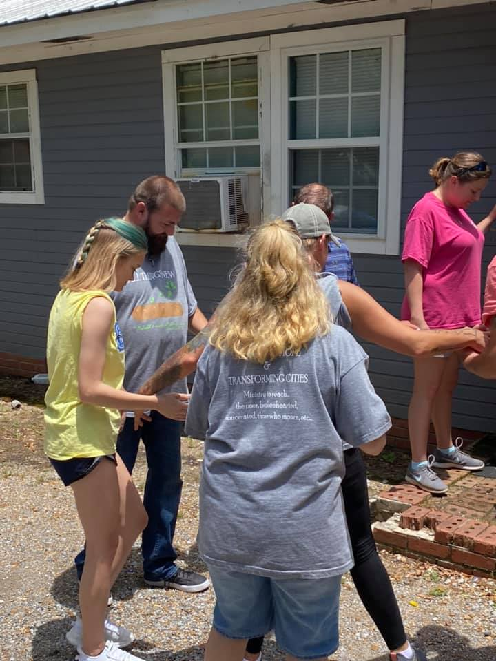 Prayer Circle After Storm